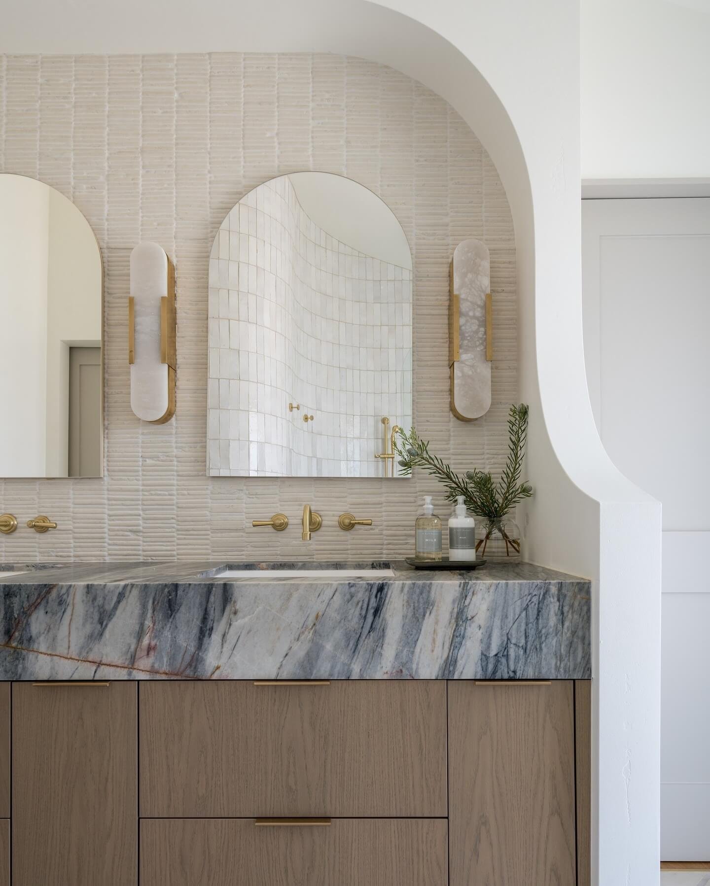 Soft Textured Tiles Create a Serene Bathroom Aesthetic