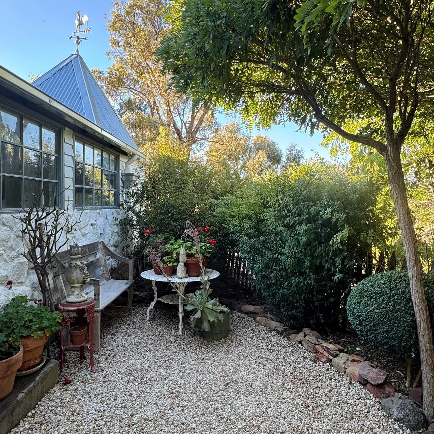 Cozy Gravel Retreat with Greenery