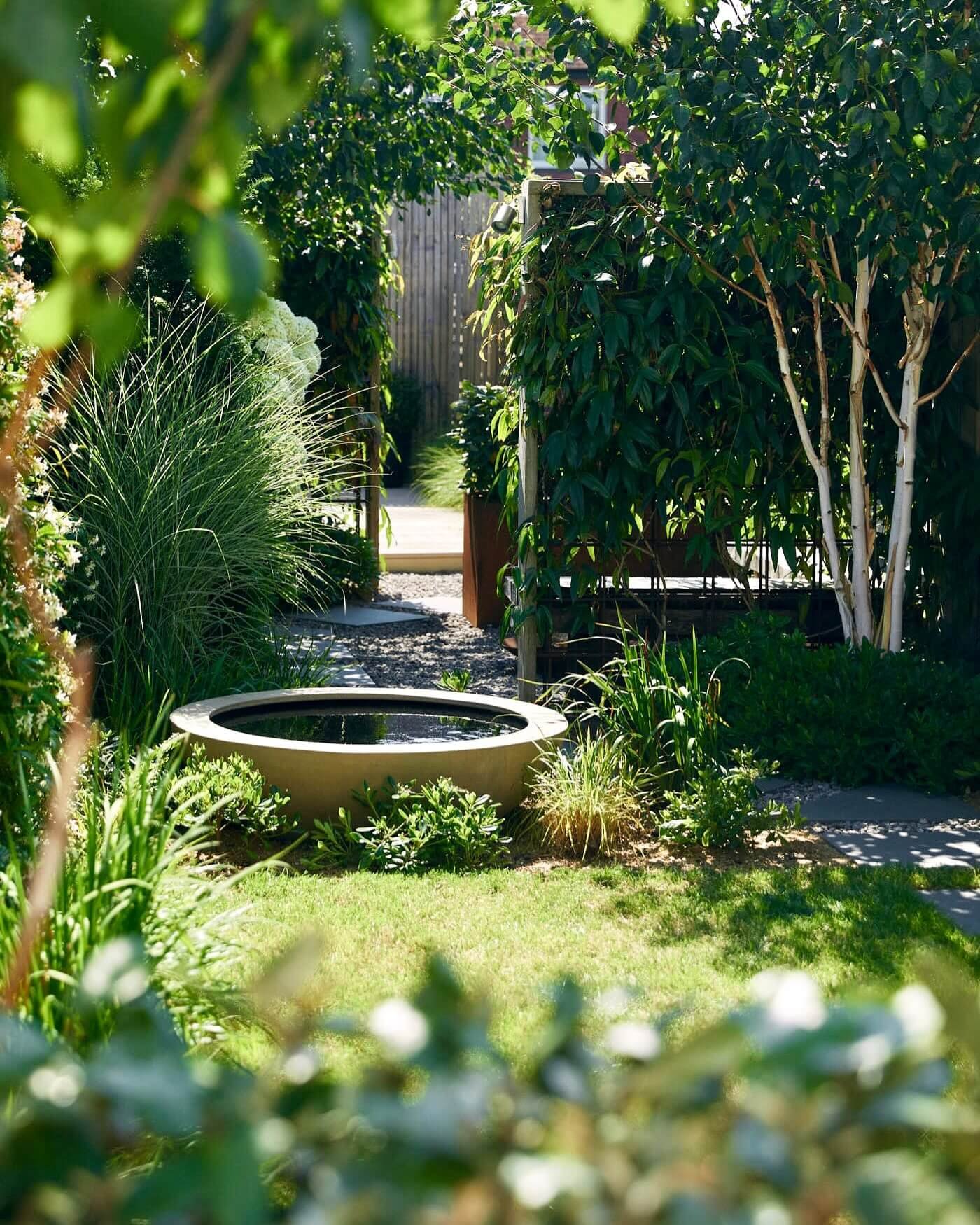 Tranquil Green Retreat with Water Feature